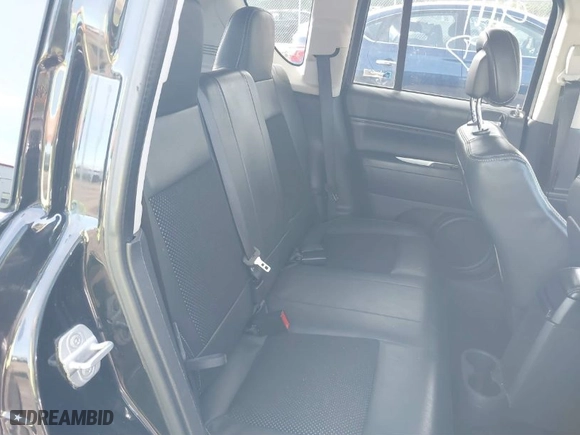 2014 Jeep Compass Latitude with VIN 1C4NJDEB0ED622084, listed as a IAAI auction lot 40412845 with 191,571 mi miles. Bid and sale history available at carsss.com. Image 8.