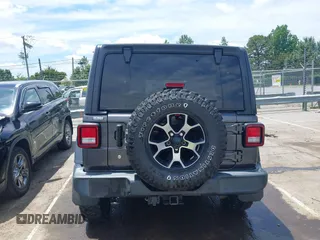 2019 Jeep Wrangler Unlimited Sport S with VIN 1C4HJXDN4KW577273, listed as a IAAI auction lot 42435847 with 69,403 mi miles and . Bid and sale history available at DreamBid. Image 16.