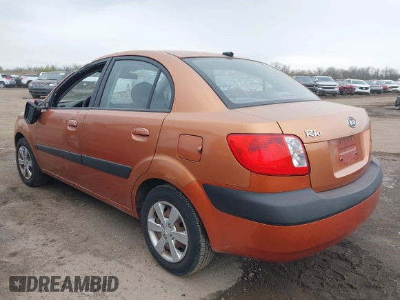 2009 Kia Rio LX with VIN KNADE223096543331, listed as a IAAI auction lot 41978544 with 166,749 mi miles and . Bid and sale history available at DreamBid. Image 3.