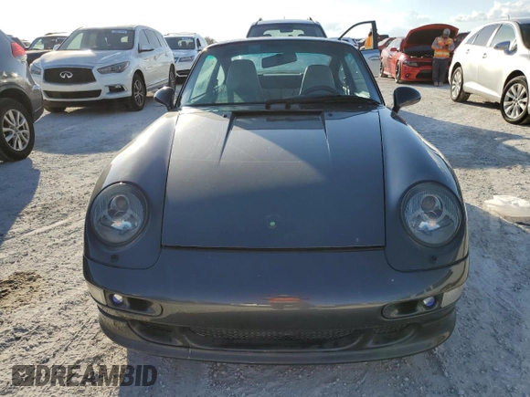 1995 Porsche 911 Carrera with VIN WP0AA2994SS323280, listed as a Copart auction lot 75304104 with 105,675 mi miles and Salvage Title. Bid and sale history available at carsss.com. Image 5.