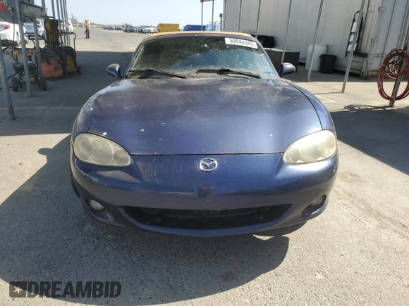 2002 Mazda MX-5 Miata Cloth z VIN JM1NB353220222868, wystawiony jako Copart lot #59944345 z przebiegiem 159 595 mil mil oraz Szkoda całkowita • Salvage title. Historia ofert i sprzedaży dostępna na DreamBid. Obrazek 5.