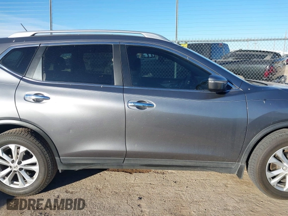 2015 Nissan Rogue SV with VIN KNMAT2MT1FP583514, listed as a IAAI auction lot 41389269 with 128,016 mi miles. Bid and sale history available at carsss.com. Image 13.