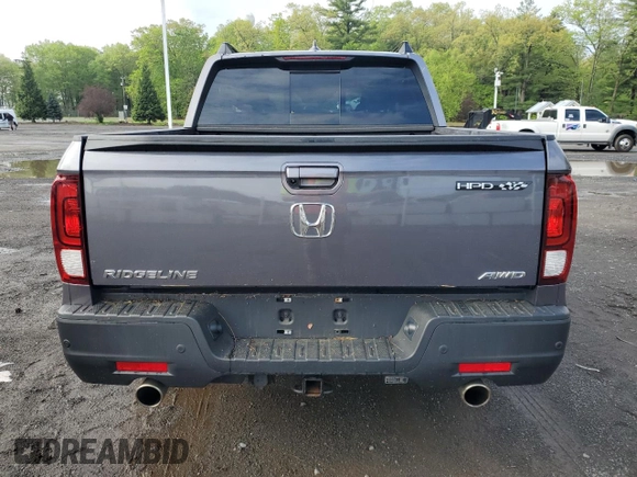 2022 Honda Ridgeline RTL-E with VIN 5FPYK3F79NB013946, listed as a Copart auction lot 55568745 with 21,541 mi miles and Salvage title. Bid and sale history available at DreamBid. Image 6.