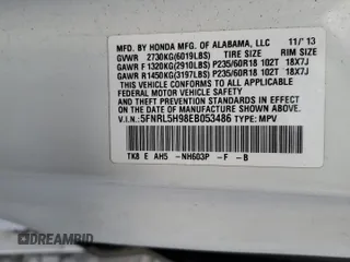 2014 Honda Odyssey Touring with VIN 5FNRL5H98EB053486, listed as a Copart auction lot 58004225 with 201,526 mi miles and Salvage title. Bid and sale history available at DreamBid. Image 14.