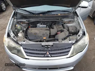 2009 Mitsubishi Outlander SE z VIN JA4MT31W89Z003101, wystawiony jako IAAI lot #41487678 z przebiegiem 90 226 mil mil oraz . Historia ofert i sprzedaży dostępna na DreamBid. Obrazek 10.