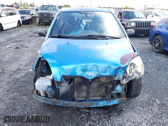 2005 Toyota ECHO z VIN JTDJT123X50066099, wystawiony jako Copart lot #74203284 z przebiegiem 134 249 mil mil oraz Szkoda całkowita • Salvage title. Historia ofert i sprzedaży dostępna na DreamBid. Obrazek 5.