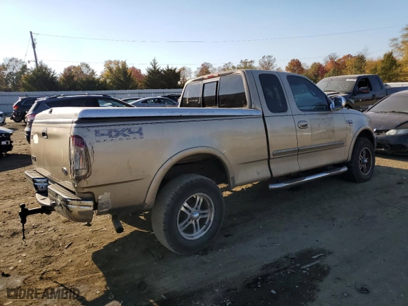 1999 Ford F-150 Work Series with VIN 1FTRX18WXXNA56977, listed as a Copart auction lot 77179044 with 0 mi miles and Salvage Title. Bid and sale history available at carsss.com. Image 3.