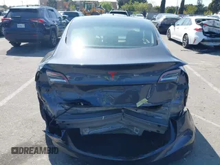 2023 Tesla Model 3 z VIN 5YJ3E1EA5PF401299, wystawiony jako IAAI lot #41968352 z przebiegiem 20 541 mil mil oraz . Historia ofert i sprzedaży dostępna na DreamBid. Obrazek 17.