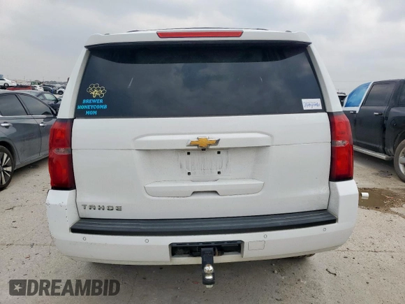 2018 Chevrolet Tahoe LT с VIN 1GNSCBKC6JR219553, выставлен на аукционе Copart как лот 57497755 с пробегом 131 846 миль миль и Списание • Salvage title. История ставок и продаж доступна на DreamBid. Изображение 6.