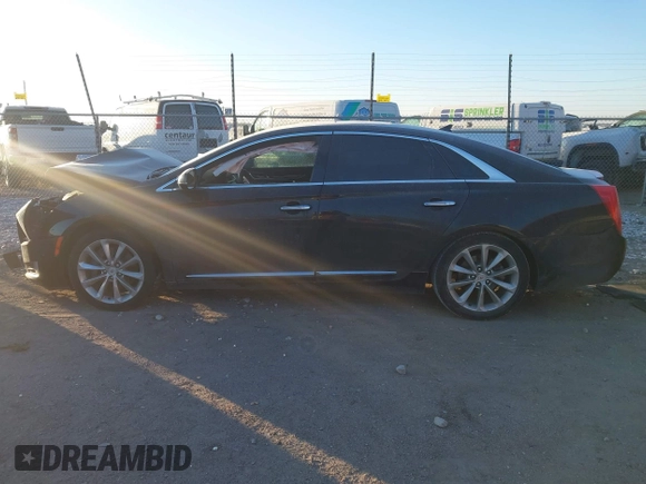 2014 Cadillac XTS Luxury with VIN 2G61M5S32E9289279, listed as a IAAI auction lot 41279495 with 106,655 mi miles. Bid and sale history available at carsss.com. Image 15.