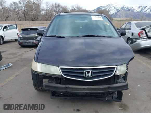 2004 Honda Odyssey EX-L with VIN 5FNRL18914B037976, listed as a IAAI auction lot 41893438 with Not Provided miles and . Bid and sale history available at DreamBid. Image 12.