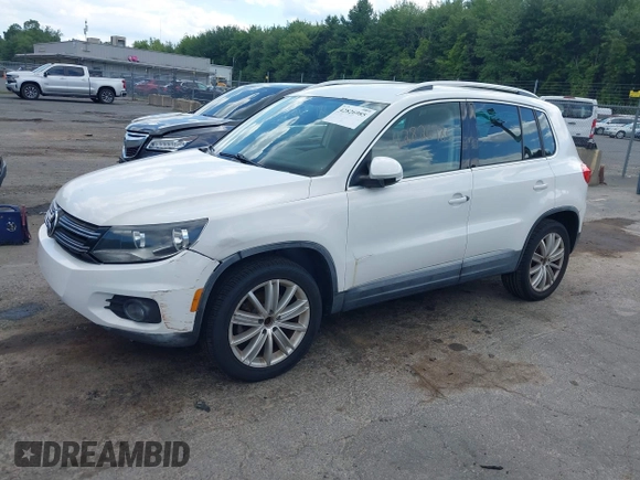 2012 Volkswagen Tiguan S with VIN WVGAV7AX0CW566151, listed as a IAAI auction lot 42826985 with 121,185 mi miles and . Bid and sale history available at DreamBid. Image 2.
