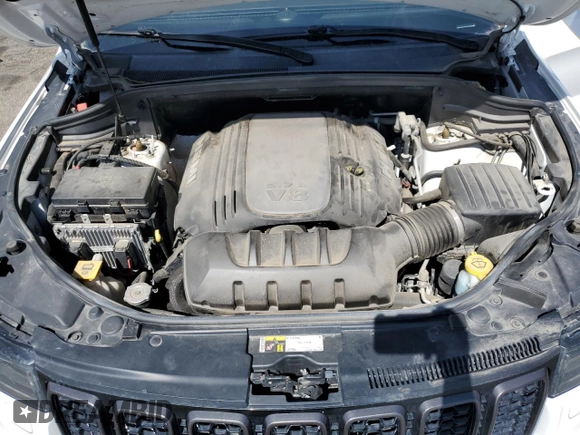2018 Jeep Grand Cherokee High Altitude with VIN 1C4RJFCT9JC293653, listed as a Copart auction lot 58833145 with 96,808 mi miles and Salvage title. Bid and sale history available at DreamBid. Image 11.
