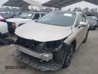 2016 Lexus RX 350 z VIN 2T2ZZMCA7GC026468, wystawiony jako IAAI lot #42433640 z przebiegiem 91 376 mil mil oraz . Historia ofert i sprzedaży dostępna na DreamBid. Obrazek 18.