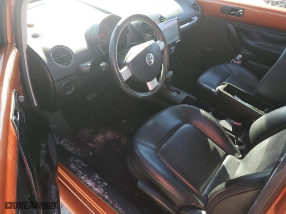2010 Volkswagen New Beetle Coupe with VIN 3VWRW3AG8AM035450, listed as a Copart auction lot 77938214 with 48,862 mi miles and Salvage Title. Bid and sale history available at carsss.com. Image 8.