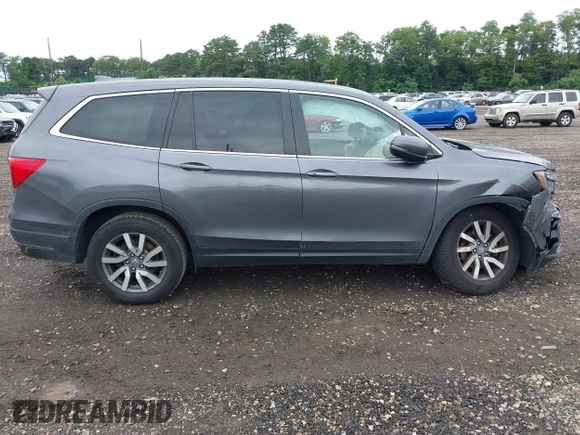 2019 Honda Pilot EX-L with VIN 5FNYF6H5XKB096065, listed as a IAAI auction lot 42631239 with 171,768 mi miles and . Bid and sale history available at DreamBid. Image 13.