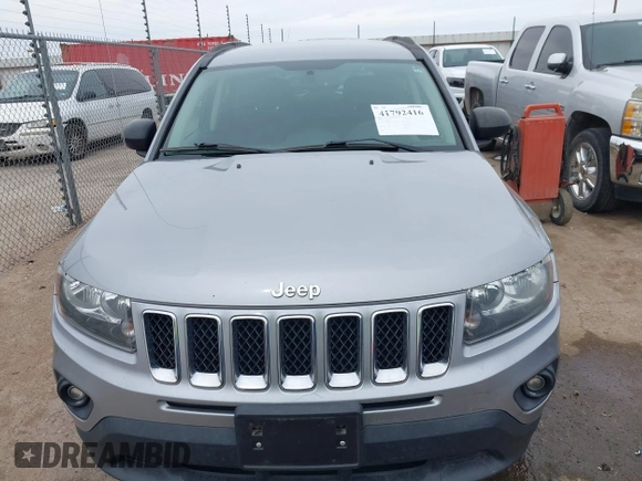 2016 Jeep Compass Sport with VIN 1C4NJDBB8GD780146, listed as a IAAI auction lot 41792416 with 127,548 mi miles. Bid and sale history available at carsss.com. Image 12.