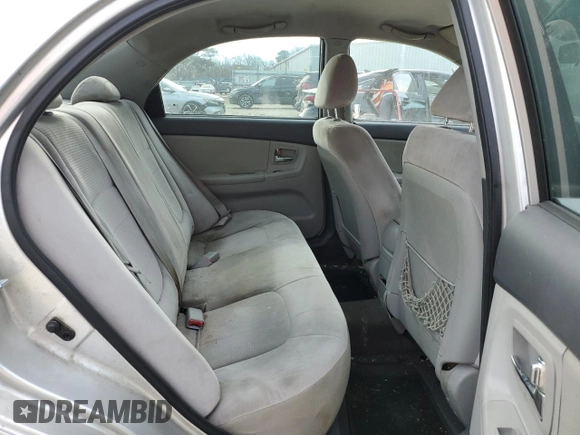 2009 Kia Spectra EX z VIN KNAFE222695665181, wystawiony jako Copart lot #42852235 z przebiegiem 234 852 mil mil oraz Szkoda całkowita • Salvage title. Historia ofert i sprzedaży dostępna na DreamBid. Obrazek 10.