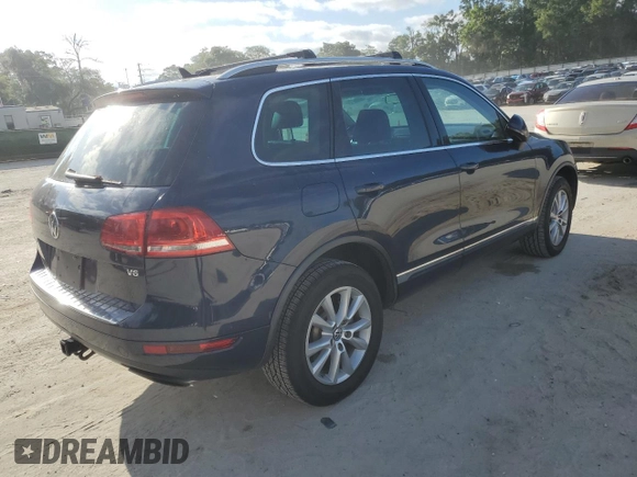 2014 Volkswagen Touareg Sport with VIN WVGEF9BP0ED005648, listed as a Copart auction lot 53230315 with 188,103 mi miles and Clean Title. Bid and sale history available at DreamBid. Image 3.