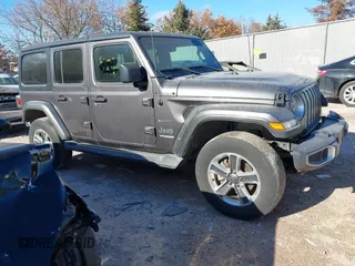 2019 Jeep Wrangler Unlimited Sahara with VIN 1C4HJXEN0KW687686, listed as a IAAI auction lot 41442450 with 58,603 mi miles and . Bid and sale history available at DreamBid. Image 1.