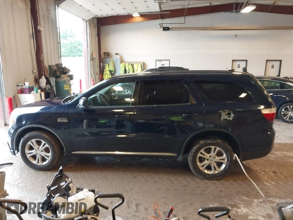 2012 Dodge Durango SXT with VIN 1C4RDJAG9CC169871, listed as a IAAI auction lot 42558583 with 259,113 mi miles and . Bid and sale history available at DreamBid. Image 14.
