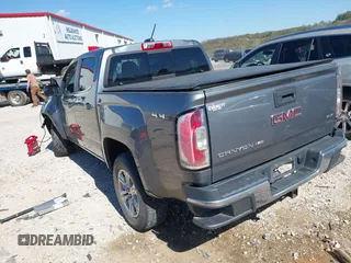 2019 GMC Canyon 4WD SLE with VIN 1GTG6CEN2K1102111, listed as a IAAI auction lot 41938971 with 156,260 mi miles and . Bid and sale history available at carsss.com. Image 3.