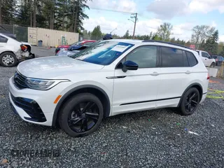 2023 Volkswagen Tiguan SE R-Line Black with VIN 3VVCB7AX3PM014446, listed as a IAAI auction lot 42016885 with 12,726 mi miles and . Bid and sale history available at DreamBid. Image 14.