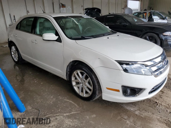 2012 Ford Fusion SEL z VIN 3FAHP0JG9CR164030, wystawiony jako Copart lot #62926985 z przebiegiem 136 043 mil mil oraz Szkoda całkowita • Salvage title. Historia ofert i sprzedaży dostępna na DreamBid. Obrazek 4.