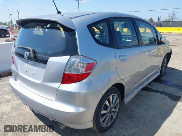 2013 Honda Fit Sport with VIN JHMGE8H51DC005760, listed as a IAAI auction lot 42040427 with 184,375 mi miles. Bid and sale history available at carsss.com. Image 4.