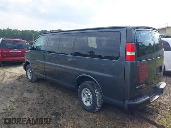 2014 Chevrolet Express Passenger LS with VIN 1GAWGPFG6E1173373, listed as a IAAI auction lot 42275513 with 26,642 mi miles and . Bid and sale history available at DreamBid. Image 3.