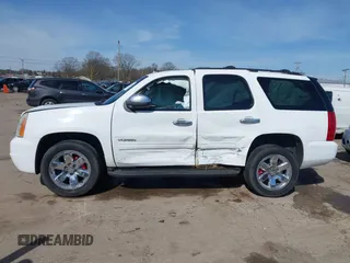 2011 GMC Yukon SLE with VIN 1GKS2AE01BR351651, listed as a IAAI auction lot 41942032 with 337,165 mi miles. Bid and sale history available at carsss.com. Image 14.