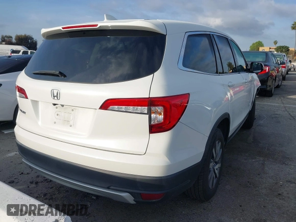 2021 Honda Pilot EX z VIN 5FNYF5H33MB031960, wystawiony jako IAAI lot #41599630 z przebiegiem 32 747 mil mil oraz . Historia ofert i sprzedaży dostępna na DreamBid. Obrazek 4.