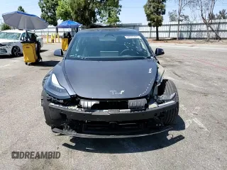 2023 Tesla Model 3 with VIN 5YJ3E1EA4PF615975, listed as a Copart auction lot 58845405 with 38,927 mi miles and Salvage title. Bid and sale history available at DreamBid. Image 13.