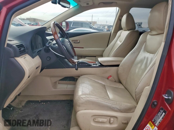 2010 Lexus RX 450h with VIN JTJZB1BA8A2000148, listed as a Copart auction lot 50135795 with 181,223 mi miles and Salvage title. Bid and sale history available at DreamBid. Image 7.
