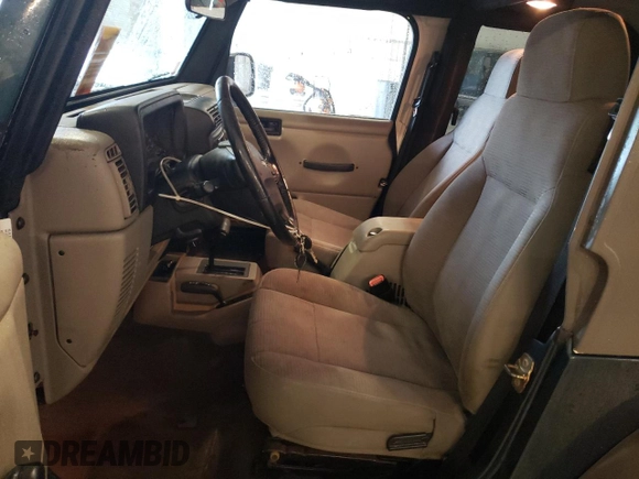2005 Jeep Wrangler Sport with VIN 1J4FA49S35P341517, listed as a Copart auction lot 65224645 with 153,832 mi miles and Clean title. Bid and sale history available at DreamBid. Image 7.