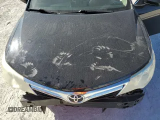 2014 Toyota Camry L with VIN 4T4BF1FK2ER376447, listed as a Copart auction lot 82886974 with 112,833 mi miles and Salvage Title. Bid and sale history available at DreamBid. Image 11.