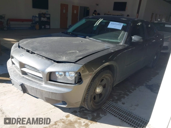 2009 Dodge Charger Police with VIN 2B3LA43V29H639662, listed as a IAAI auction lot 41652161 with 70,920 mi miles and . Bid and sale history available at carsss.com. Image 2.