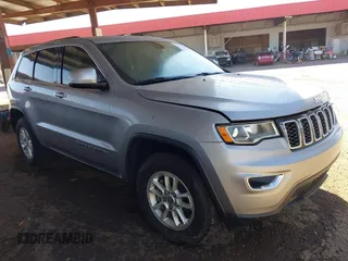 2018 Jeep Grand Cherokee Laredo E with VIN 1C4RJEAG3JC399869, listed as a IAAI auction lot 42305627 with 64,004 mi miles and . Bid and sale history available at DreamBid. Image 1.