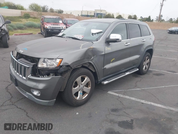 2013 Jeep Grand Cherokee Limited with VIN 1C4RJEBTXDC539433, listed as a IAAI auction lot 42046724 with 266,913 mi miles. Bid and sale history available at carsss.com. Image 2.