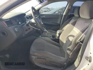 2014 Chevrolet Impala LT with VIN 2G1WB5E3XE1128402, listed as a Copart auction lot 63413525 with 101,161 mi miles and Salvage title. Bid and sale history available at DreamBid. Image 7.
