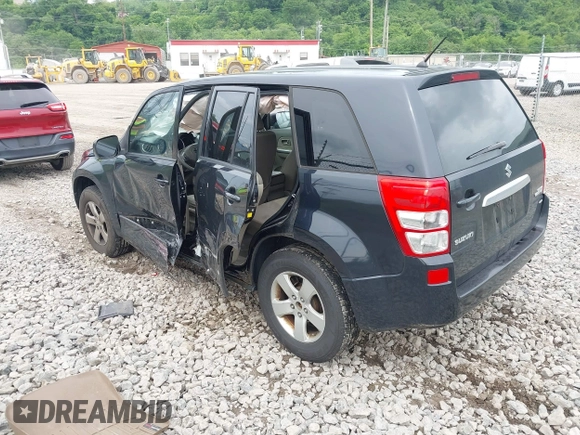 2012 Suzuki Grand Vitara Premium z VIN JS3TD0D6XC4100539, wystawiony jako IAAI lot #42384659 z przebiegiem 143 711 mil mil oraz . Historia ofert i sprzedaży dostępna na DreamBid. Obrazek 3.