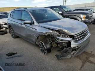 2023 Volkswagen Tiguan S with VIN 3VVFB7AX0PM086699, listed as a Copart auction lot 62885184 with 5,694 mi miles and Salvage title. Bid and sale history available at DreamBid. Image 4.
