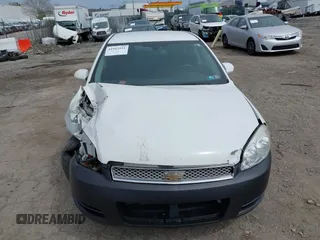2014 Chevrolet Impala LS with VIN 2G1WA5E38E1141734, listed as a IAAI auction lot 41942551 with 110,805 mi miles and . Bid and sale history available at DreamBid. Image 12.