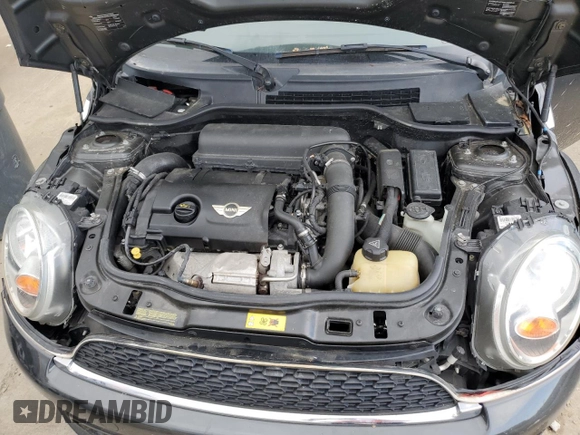 2014 MINI Convertible S with VIN WMWZP3C53ET298154, listed as a Copart auction lot 53971615 with 85,499 mi miles and Salvage title. Bid and sale history available at DreamBid. Image 11.