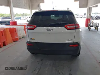 2016 Jeep Cherokee Latitude z VIN 1C4PJMCB5GW296303, wystawiony jako IAAI lot #42135490 z przebiegiem 136 503 mil mil oraz . Historia ofert i sprzedaży dostępna na DreamBid. Obrazek 16.