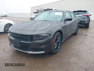 2023 Dodge Charger SXT with VIN 2C3CDXBG8PH566020, listed as a IAAI auction lot 41433879 with 22,187 mi miles and . Bid and sale history available at DreamBid. Image 2.
