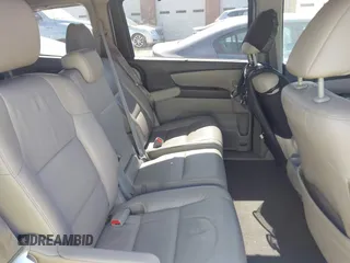 2012 Honda Odyssey Touring with VIN 5FNRL5H92CB108690, listed as a IAAI auction lot 41826580 with 150,327 mi miles and . Bid and sale history available at DreamBid. Image 8.