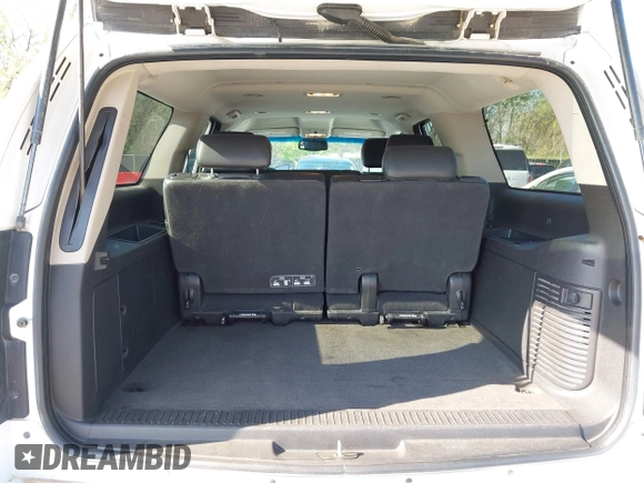 2013 Chevrolet Suburban LT with VIN 1GNSKJE75DR174167, listed as a IAAI auction lot 42005614 with 290,223 mi miles and . Bid and sale history available at DreamBid. Image 18.
