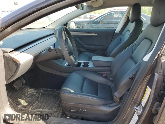 2023 Tesla Model 3 z VIN 5YJ3E1EAXPF404814, wystawiony jako Copart lot #56857105 z przebiegiem 59 360 mil mil oraz Czysty tytuł • Clean title. Historia ofert i sprzedaży dostępna na DreamBid. Obrazek 7.