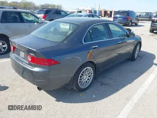 2004 Acura TSX w/Navigation with VIN JH4CL96974C017539, listed as a IAAI auction lot 41918507 with 168,557 mi miles. Bid and sale history available at carsss.com. Image 4.